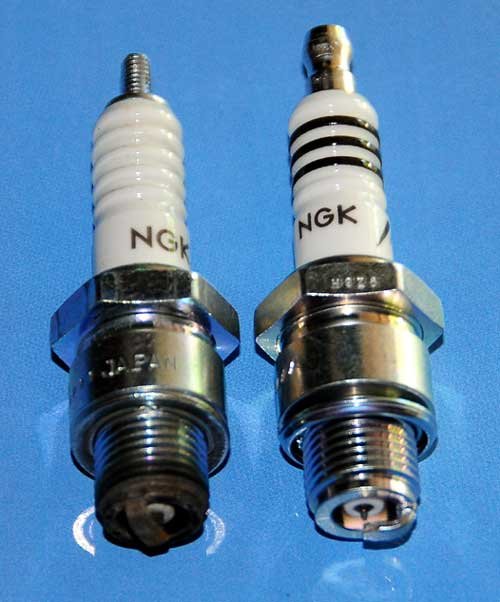 Two NGK spark plugs with different references and physical dimensions