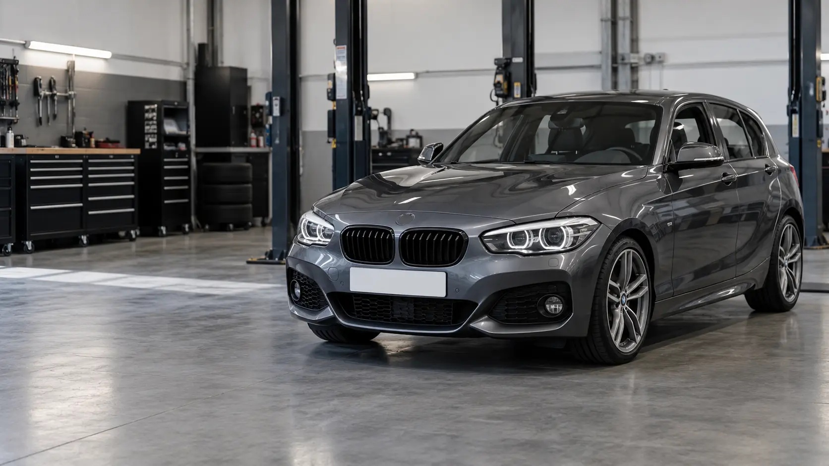 BMW hatchback in a workshop setting, illustrative image